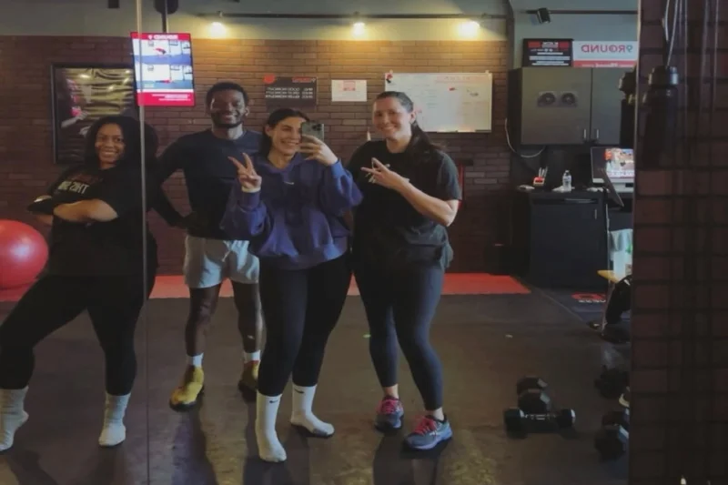 9Round Northville MI members taking a group selfie inside the kickboxing fitness gym