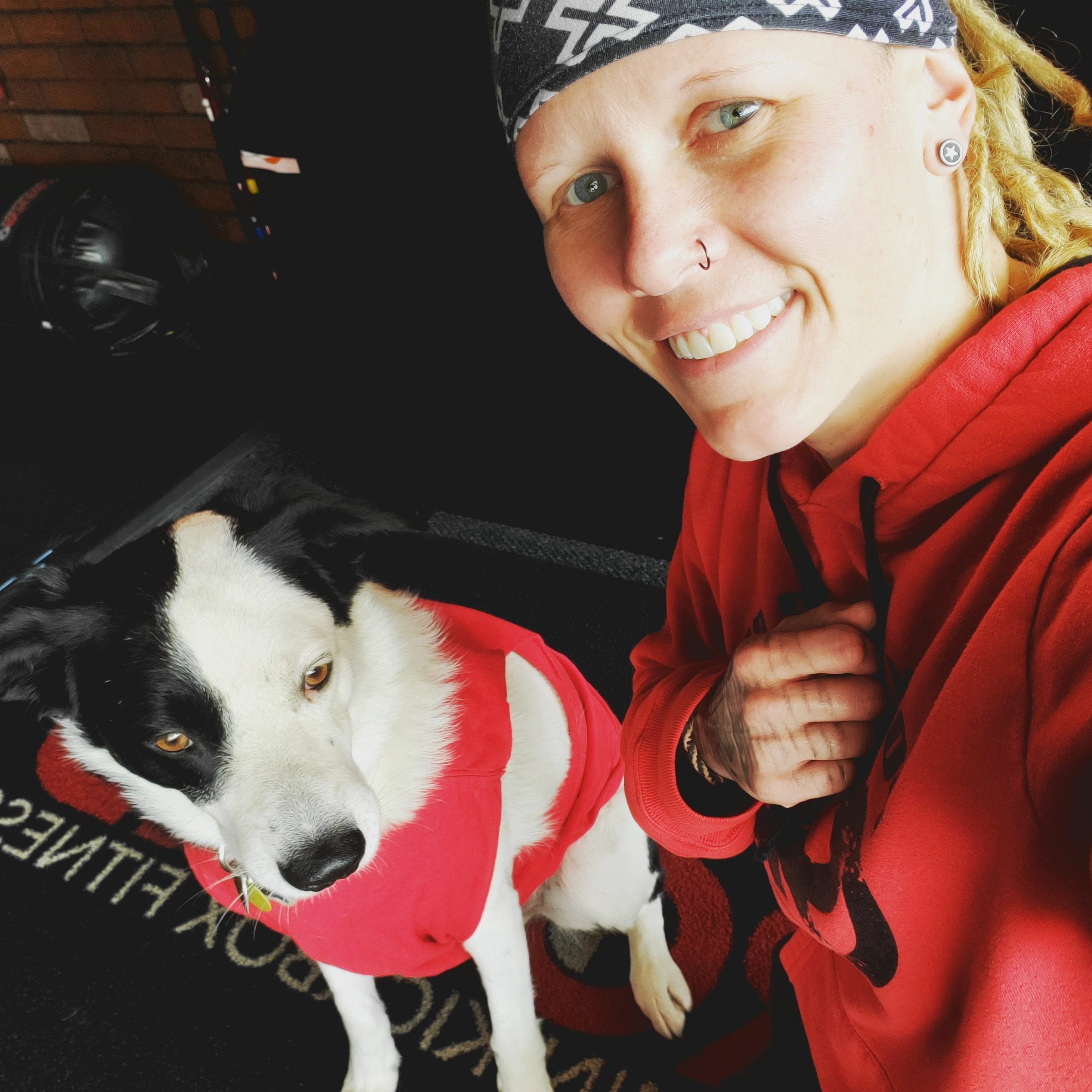 9Round owner with their dog” 
     style=