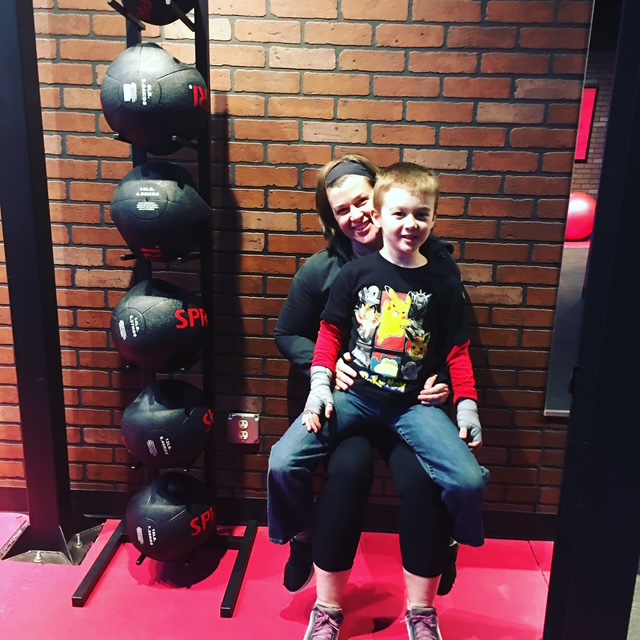 9Round owner with her son” 
     style=