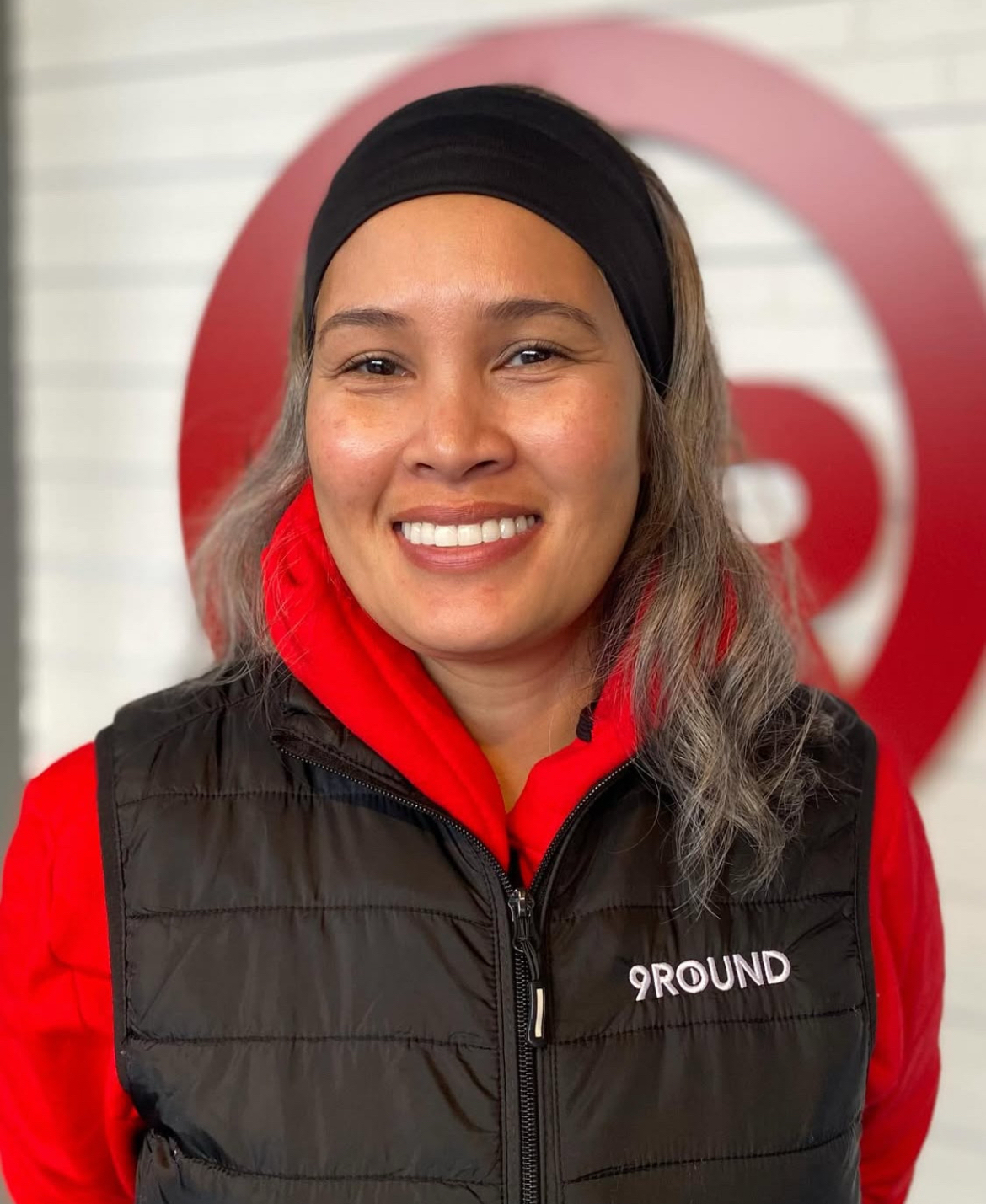 9Round female owner headshot in her studio”
style=